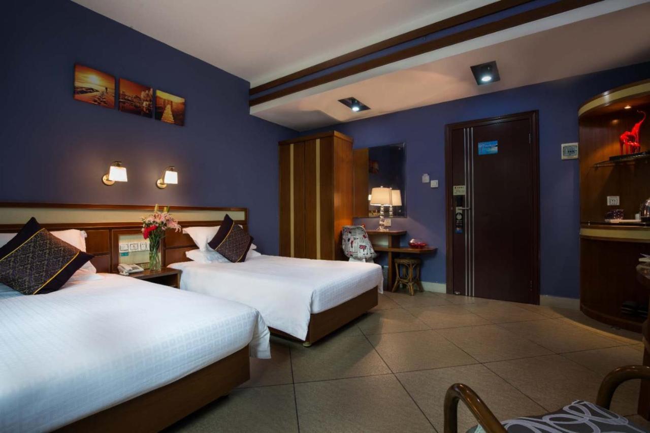 Sanya Tropical Coast Hotel Bagian luar foto